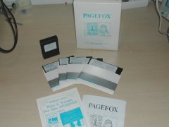 Page Fox with diskettes, manuals and original packaging.