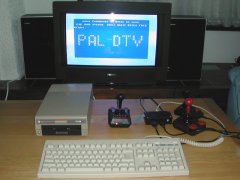 A hacked C64 DTV-2 with diskdrive and keyboard.