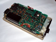 The inside of the Commodore SFD-1001 disk drive.