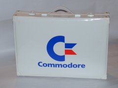 A briefcase with the Commodore logo.