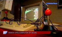 A Commodore C64c computer and a 1901 monitor on the Retro SpelComputer Beurs - TV Gelderland.
